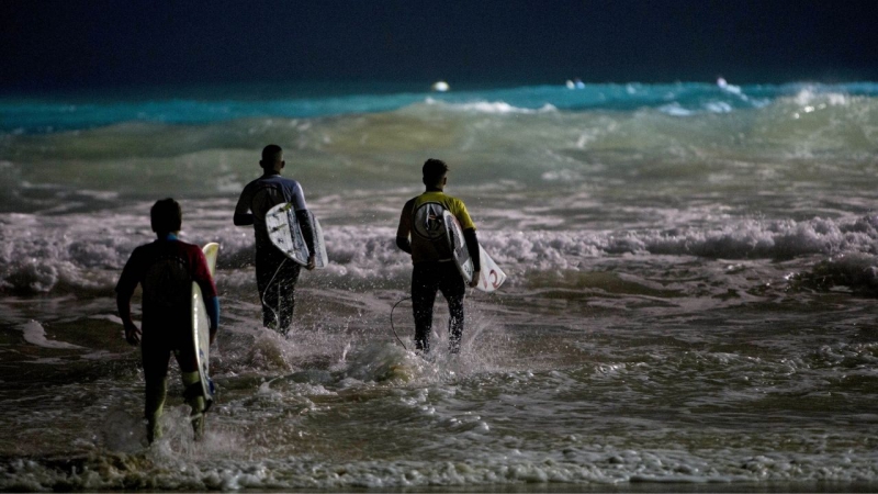 Friends Surfing